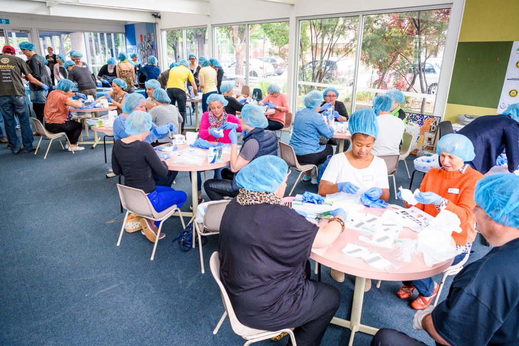 Assembling 1000 birthing kits in a day.