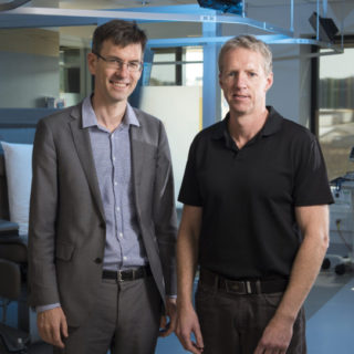 Dr Daniel Croagh and Professor Brendan Jenkins review PanKind grant to help with pancreatic cancer.