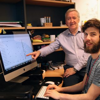 Professor Paul Hertzog and Dr Jamie Gearing investigating gene pathways at Hudson Institute