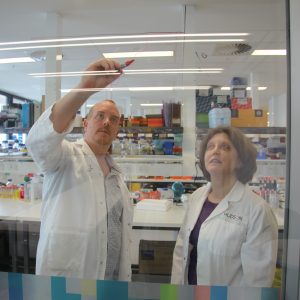 Dr Daniel Gough and Dr Christine White outlining their discovery into childhood brain tumours