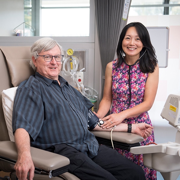 Associate Professor Jun Yang and hypertension clinical trial patient David
