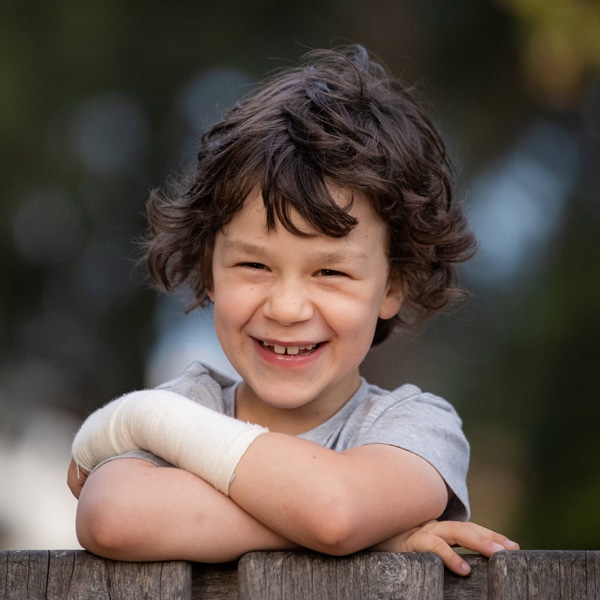 Luca Hall-Boggia a cancer survivor smiling at Hudson Institute. Picture Courtesy Jason Edwards /Herald Sun. real life stories