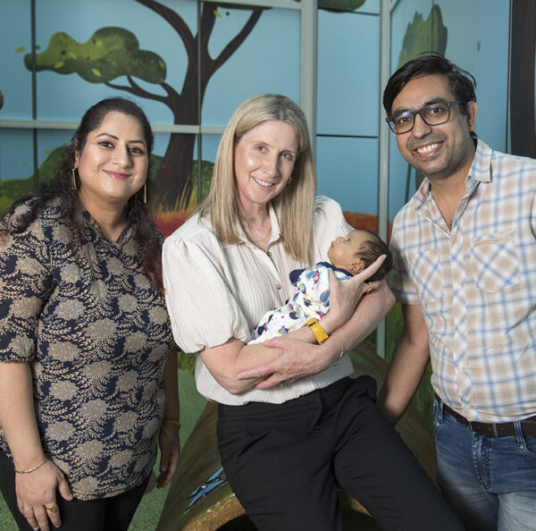 Hannah, Professor Suzanne Miller holding baby Ronick and Nav, PROTECT Me Trial participants