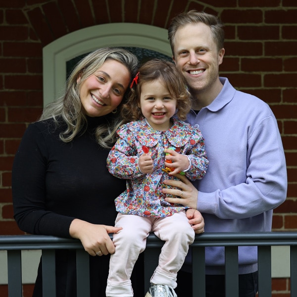 Jessica Clark, Ovarian Cancer Survivor, at home with husband Ben and daughter Matilda