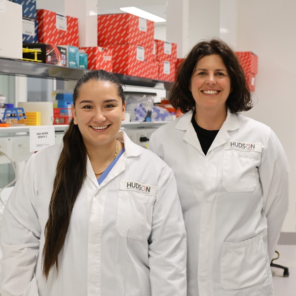 Charmaine Rock and Dr Beth Allison in the lab outlining their research on growth restricted babies at Hudson Institiute