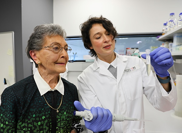 Donor and cancer survivor Delva Walker and Dr Caroline Skene in the lab