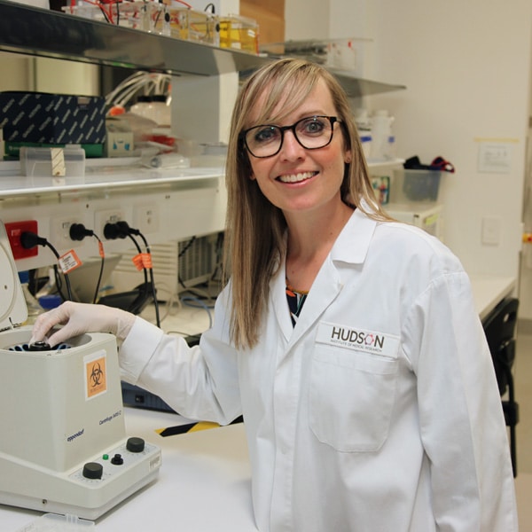 Dr Emily Camm in a lab outlining her research into Pregnancy diet as a Senior Research Scientist at Hudson Institute 