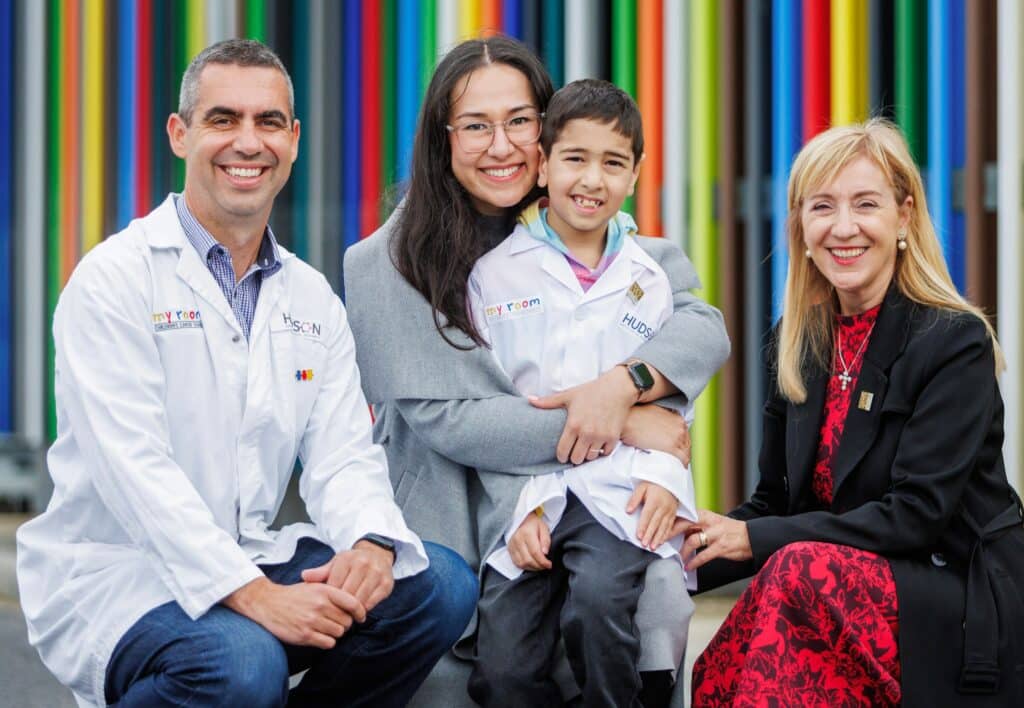 L-R: Associate Professor Jason Cain with Eli Mohibi (7) with his mother Nelly and CEO of My Room Childrens Cancer Charity Margaret Zita. Photo courtesy of Aaron Francis / Herald Sun