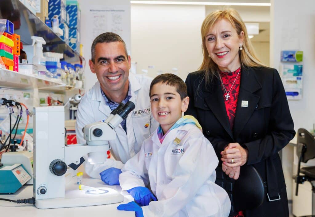 L-R: Associate Professor Jason Cain with Eli Mohibi and Margaret Zita from the My Room Childrens Cancer Charity. Photo courtesy of Aaron Francis / Herald Sun