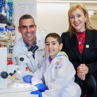 (L-R) Professor Jason Cain with Eli Mohibi (7) and Margaret Zita from the My Room Childrens Cancer Charity