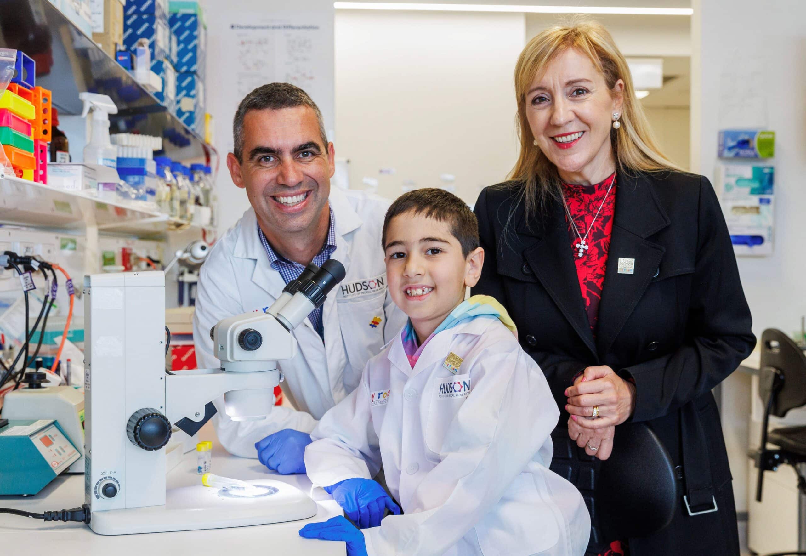 (L-R) Professor Jason Cain with Eli Mohibi (7) and Margaret Zita from the My Room Childrens Cancer Charity